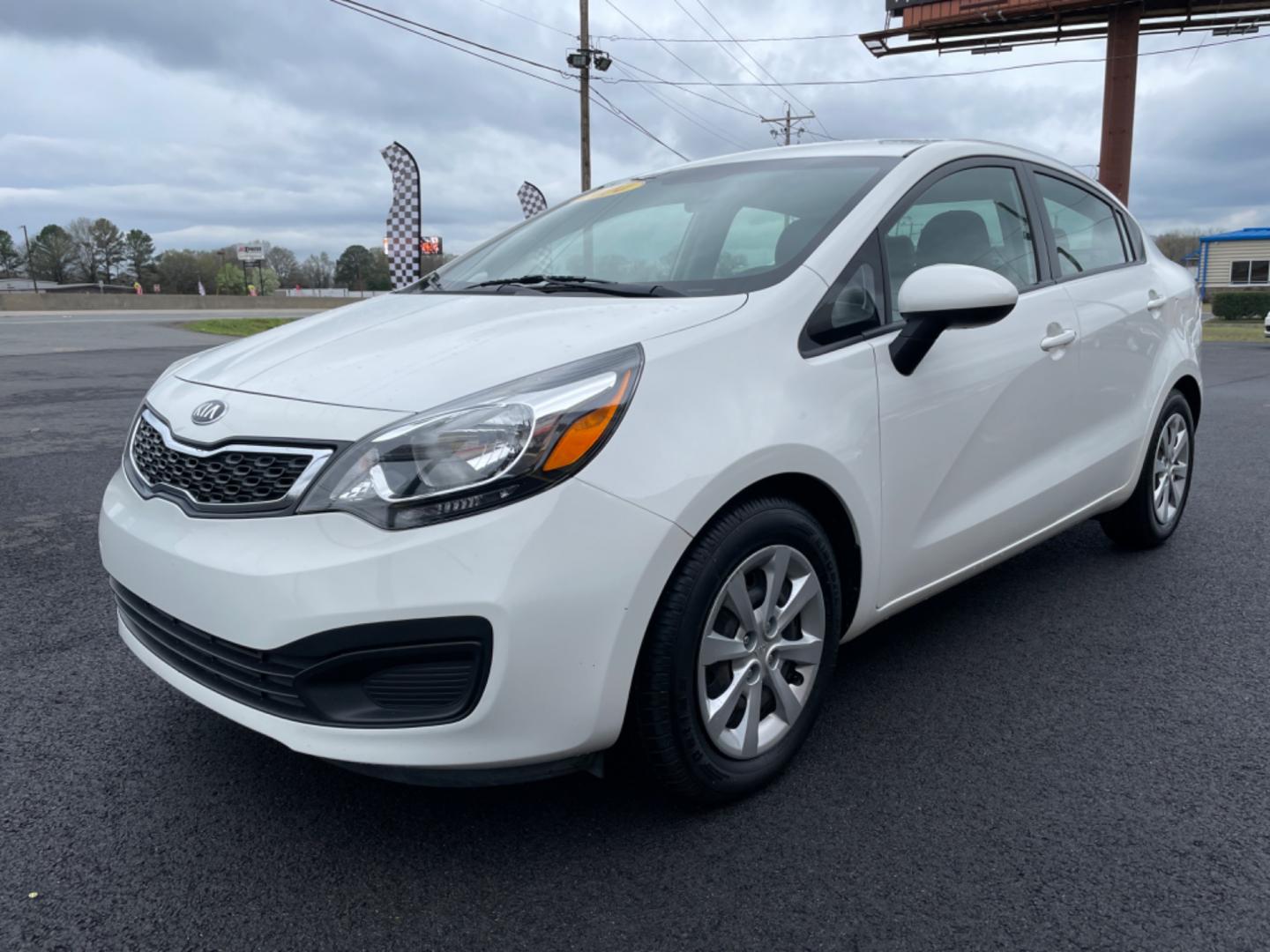 2014 White Kia Rio (KNADN4A35E6) with an 4-Cyl, 1.6 Liter engine, Automatic, 6-Spd transmission, located at 8008 Warden Rd, Sherwood, AR, 72120, (501) 801-6100, 34.830078, -92.186684 - Photo#3